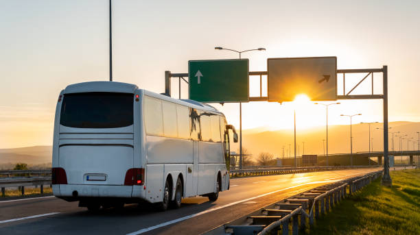istock White Modern tourist bus at sunset 1489810579