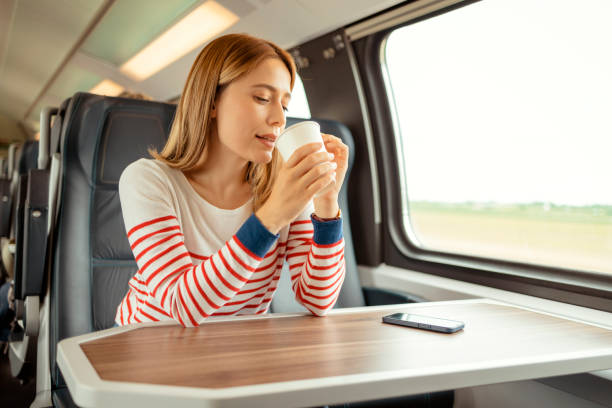 istock Female Commuter Enjoying Reusable Coffee Cup 1489810667