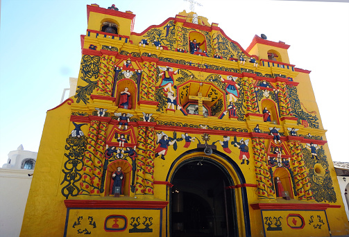 Church of various colors in the village of San Andres Xecul - Guatemala