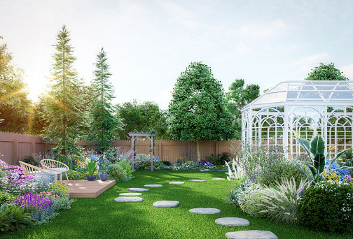 Luxury colorful backyard garden with glasshouse 3d render there are green lawn, vareity color of flowers and nature stone walkway decorated with wooden chair , morning backlit sunlight