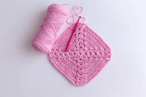 istock Crochet handmade pink color granny square pattern 1489817773