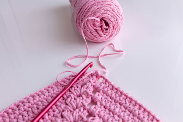 istock Crochet handmade fashion square pattern and hook 1489817988