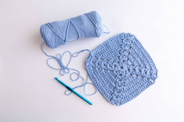 istock Crochet handmade blue jeans color granny square pattern 1489818023
