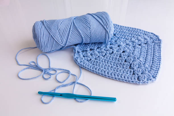 istock Crochet handmade blue jeans color granny square pattern 1489818026