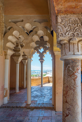 Malaga, Spain - May 18, 2019: Pabellon de Arcos Lobulados (Lobed Arches Pavilion) in Taifa palace at Alcazaba Fortress - Malaga, Andalusia, Spain