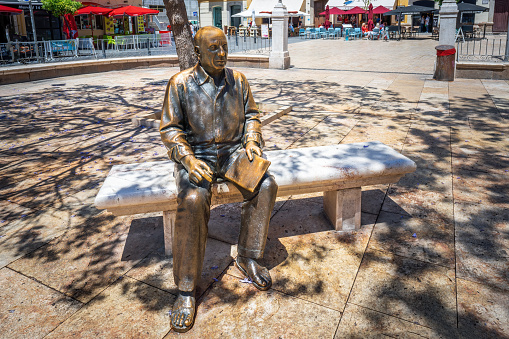 Malaga, Spain - May 20, 2019: Pablo Picasso Statue at Plaza de la Merced Square - Malaga, Andalusia, Spain