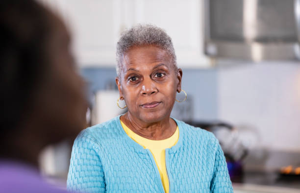 istock Senior African-American woman conversing in kitchen 1489839941