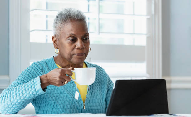 istock Senior African-American woman using digital tablet 1489840014