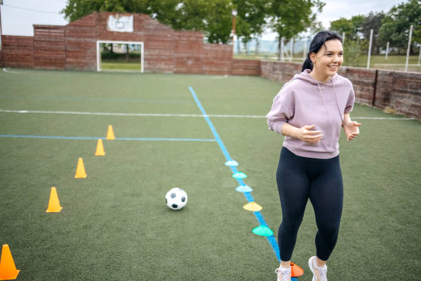 istock Young woman exercising outdoors. 1489841608