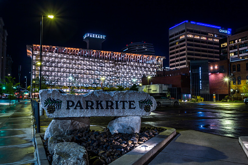 Spokane, WA, USA - May 7th, 2023: Parkrite building illuminated at night in the downtown area