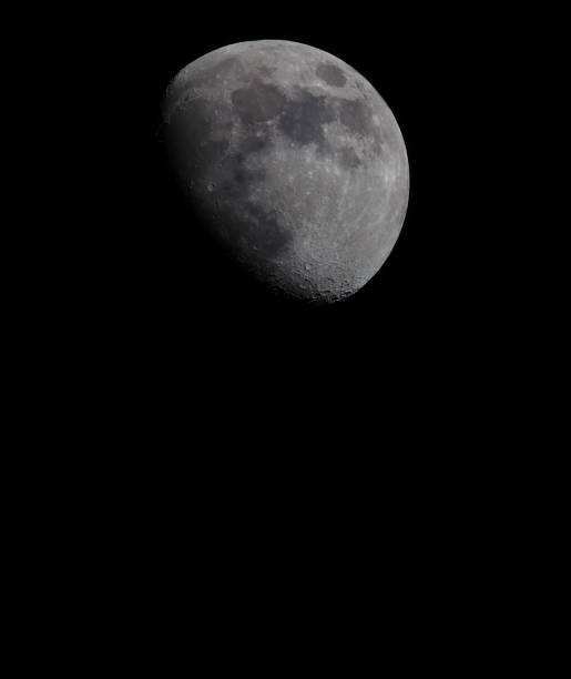 istock Night scene featuring a full moon in the dark black sky 1489854125
