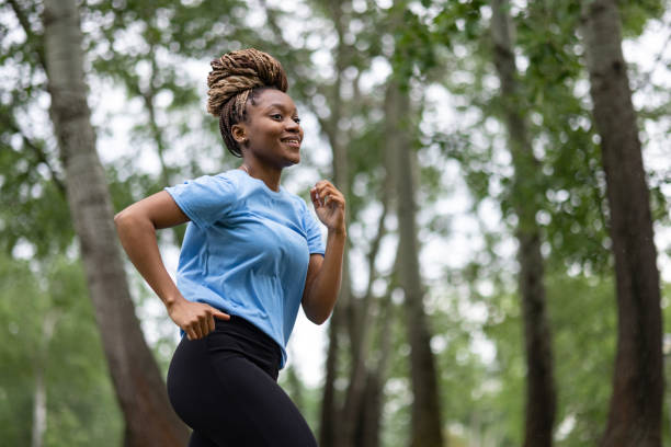 istock Woman running in the park 1489859049