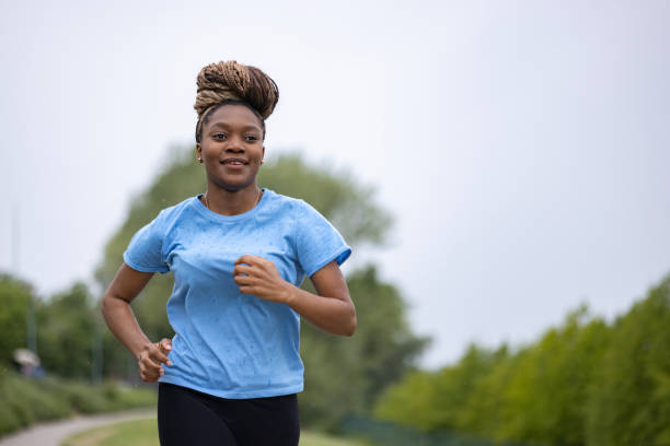 istock Woman running in the park 1489859147