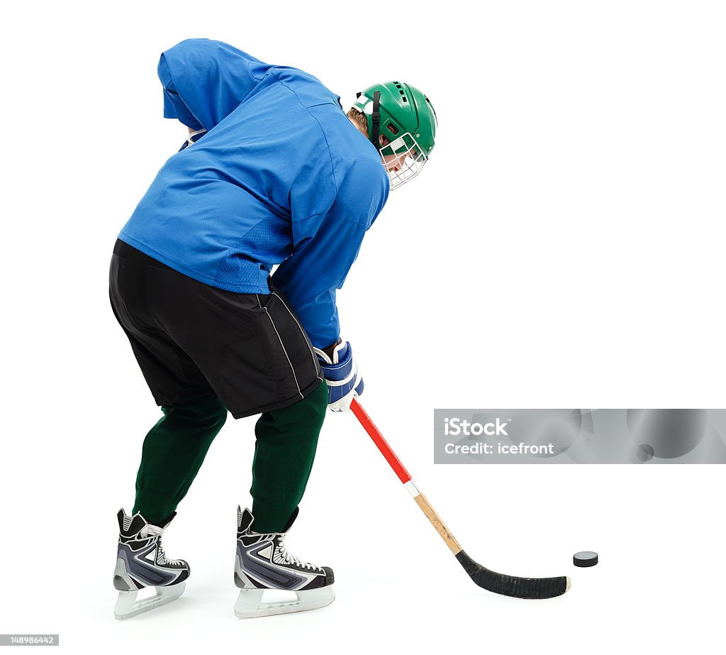 Giocatore di hockey su ghiaccio in blu - Foto stock royalty-free di Pattinaggio sul ghiaccio