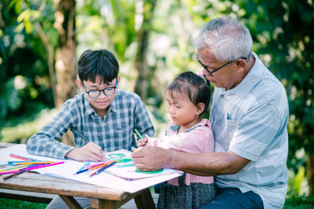 istock Happy families spending time together at the park. 1489866487