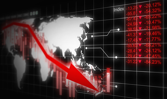 Economic Recession Concept. World Map and Financial Graph Chart in Freefall Amidst Global Financial Crisis and Stock Market Crash