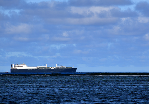 Saipan, Commonwealth of the Northern Mariana Islands (CMNI): Military Sealift Command Large, Medium-Speed Roll-on/Roll-off ship (LMSR) USNS Dahl (T-AKR 312 / IMO 9117040) in blue and white livery, Watson-class vehicle cargo ship - the human rights group Reprieve identified the Dahl as having held \