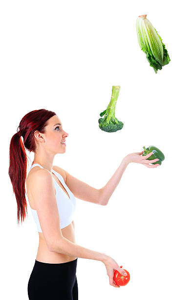 istock Woman Juggle Vegetable 148989692