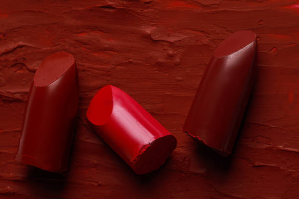 istock Many bright lipsticks and smears, top view 1489899916