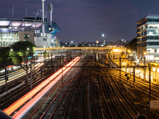 istock Train and train tracks at sunrise 1489902089