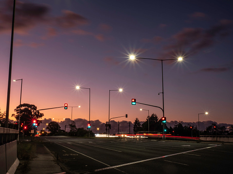 Suburban intersection at sunset