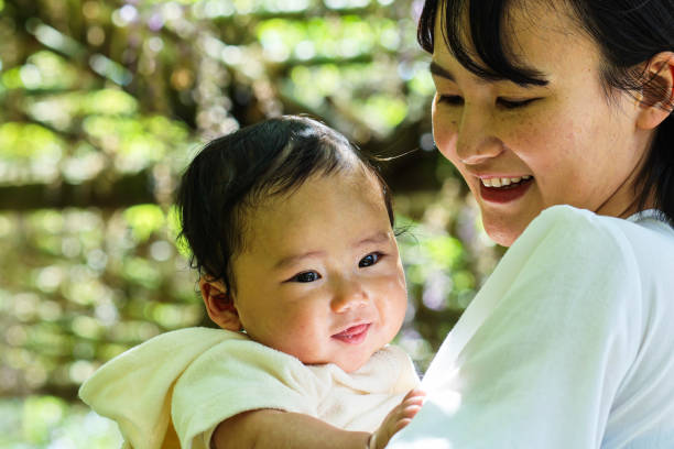 istock Mother and her baby in park 1489913803