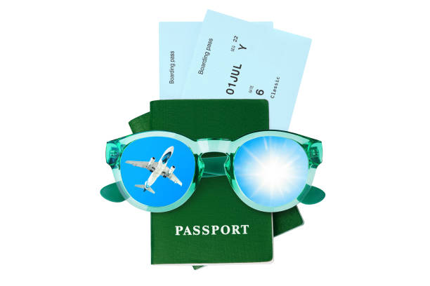 Green passports, boarding pass, flight tickets, sunglasses, flying plane, sun, blue sky, white background isolated, summer holidays, vacation, airplane travel, international airlines, tourism concept