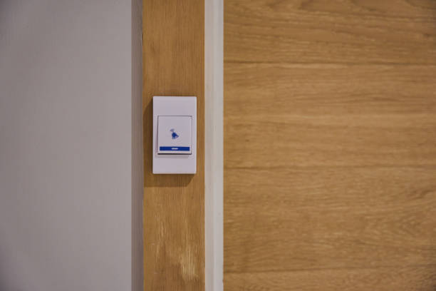 istock Door bell on wooden door 1489918934