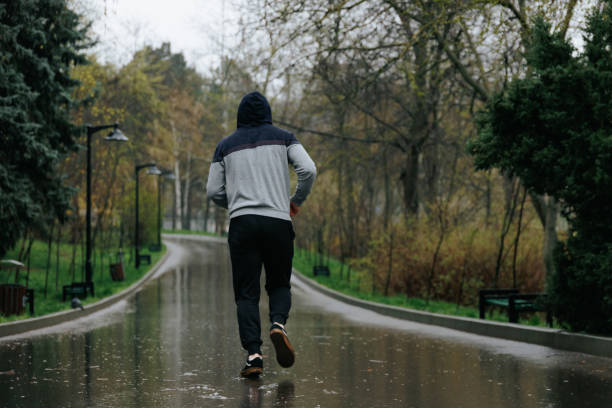 istock Jogging in the Rain A Physical Challenge for Young Adults 1489926907