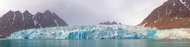 Panoramic View of an Active Arctic Glacier stock photo