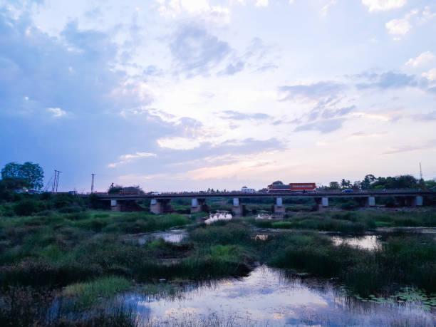 istock A shot  of a bridge above the river with sunset 1489933354