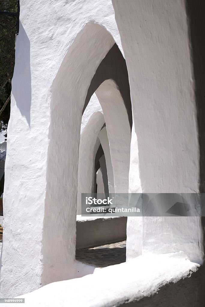 lots of windows village of Binibeca at Menorca island in Spain Alley Stock Photo