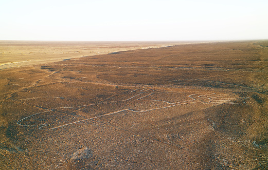 The Nazca lines called Los Manos (the hands) as seen from the viewing platform nearby, Nazca desert, Ica Region, Peru, South America