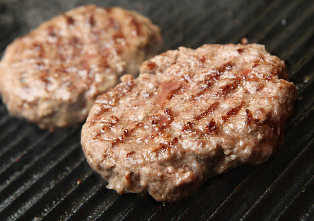istock Cooking Beef Burgers 148995373