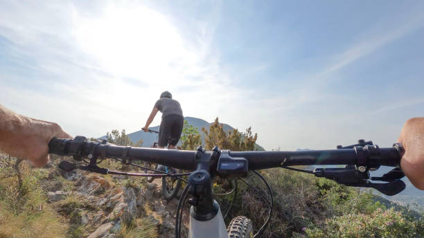 istock First person perspective following male biker ahead 1489960229