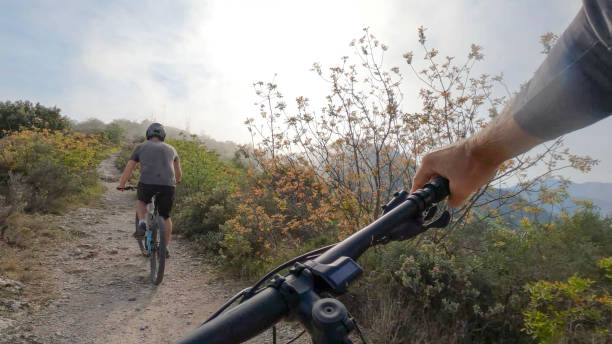 istock First person perspective following male biker ahead 1489960344