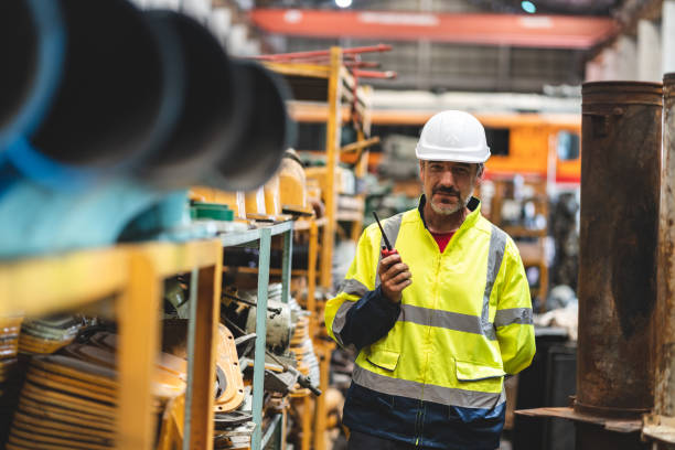 istock professional technician engineer working to control electrical power and safety service system, electrician working to maintenance and checking industrial equipment in term of factory technology 1489963085