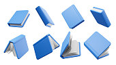 Blue books set from different angles on white background