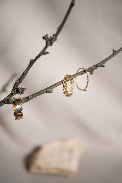 istock Still life with golden rings over beige background. Minimalistic abstract composition. 1489973573