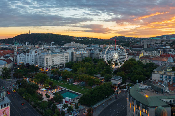 Aerial skyline view about Elizabeth Square with Ferris wheel called Budapest Eye. This is the largest green area in downtown Pest.