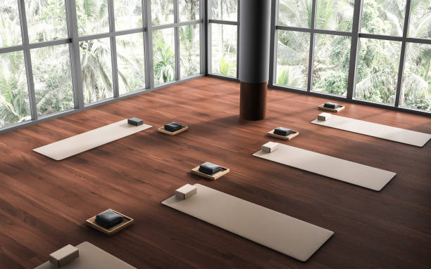istock Top view of modern yoga class interior with mat and brick, panoramic window 1489982328