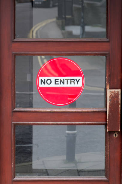 istock No Entry sight on shop door for customer segregation 1489984484