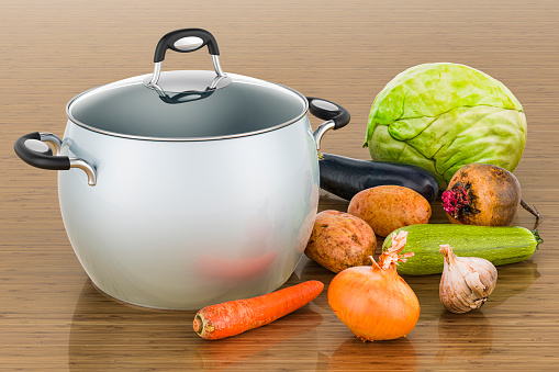Saucepan with vegetables on the wooden table. 3D rendering