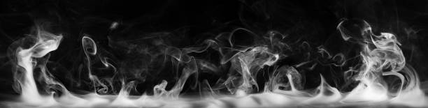 istock Abstract smoke on a dark background . Isolated . 1489992326