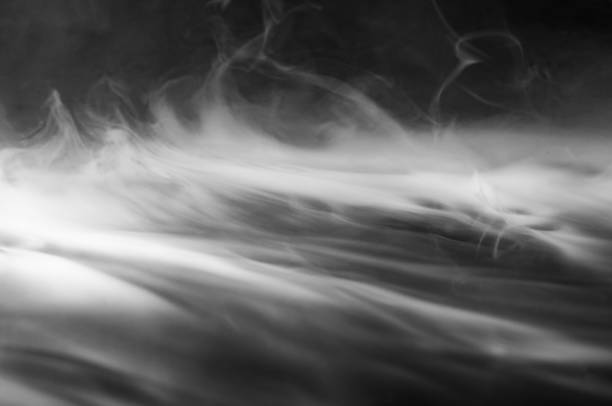 istock Abstract smoke on a dark background . Isolated . 1489992633