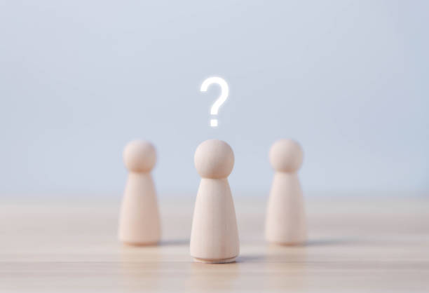 istock Wooden blocks people show question mark icon 1489996639