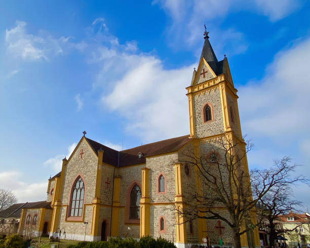 istock Yellow church outlook under blue sky, Czech 1490001200