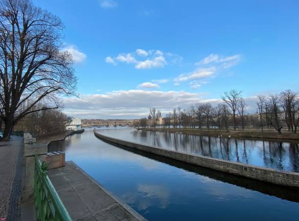 istock Cloudy blue sky and city view reflection in Praha, Czech 1490001901