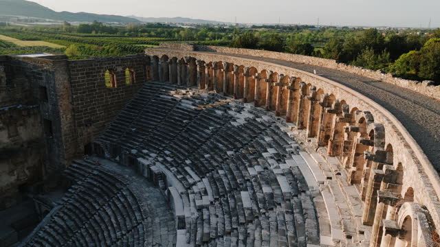 Aerial view of Antalya Aspendos Ancient City amphitheater, Historical destination Aspendos Antalya, historical places in Turkey, best preserved ancient city, aerial view of Aspendos ancient city, best historical roman ancient theater