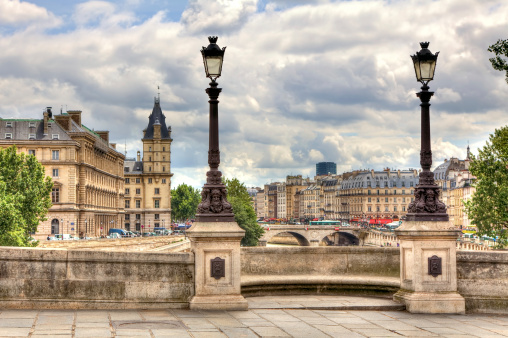 Paris cityscape. View from famous Pont Neuf with traditional lamppost. France.